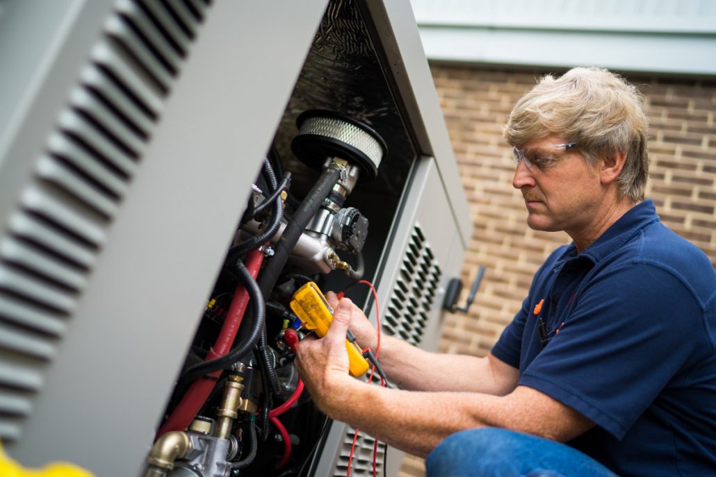 Generator One service professional performing comprehensive maintenance on a Generac generator in Ashtabula, OH