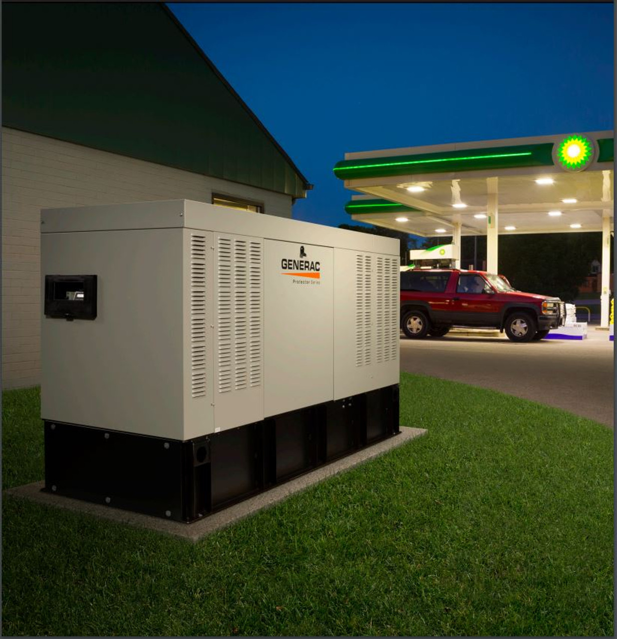 A commercial building exterior showcasing a backup generator installation.